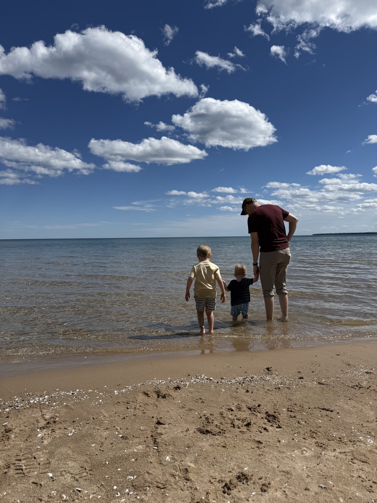Brayden and his two sons at a Wisconsin lake